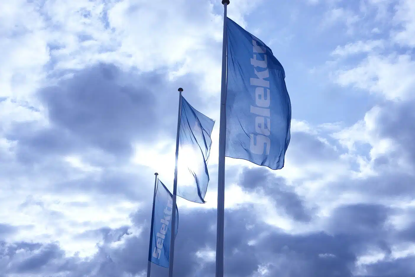 Selektro flags with blue clouds