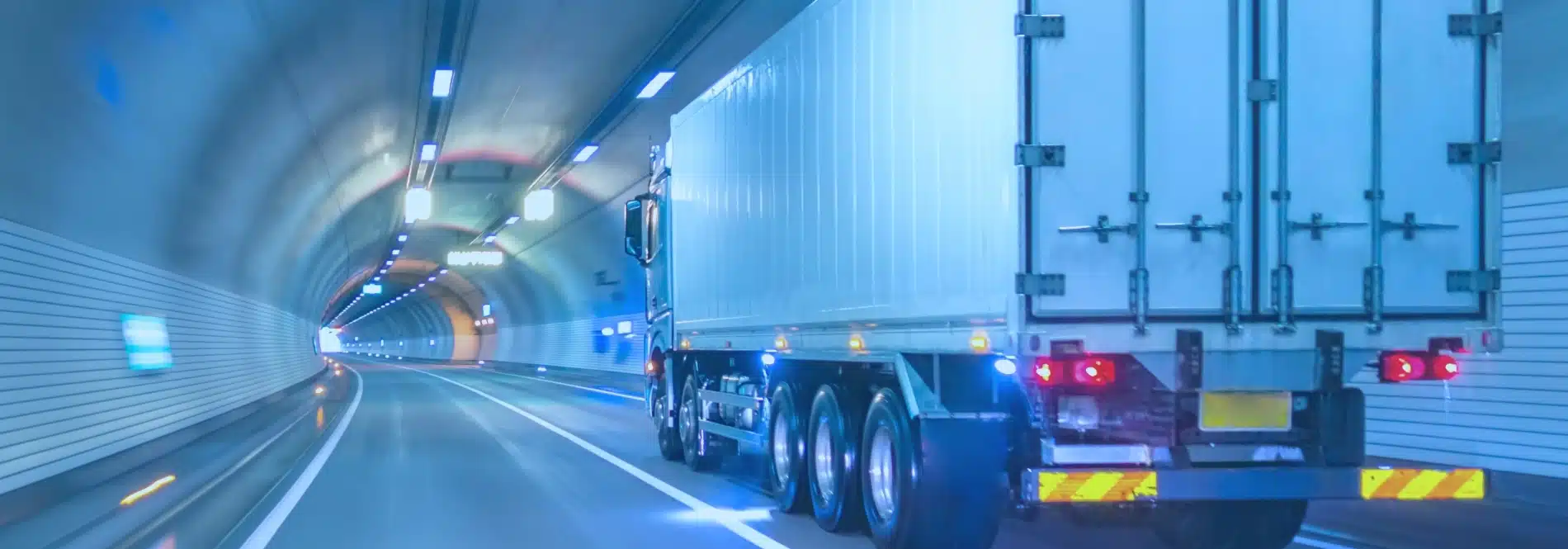 Truck drives through a tunnel